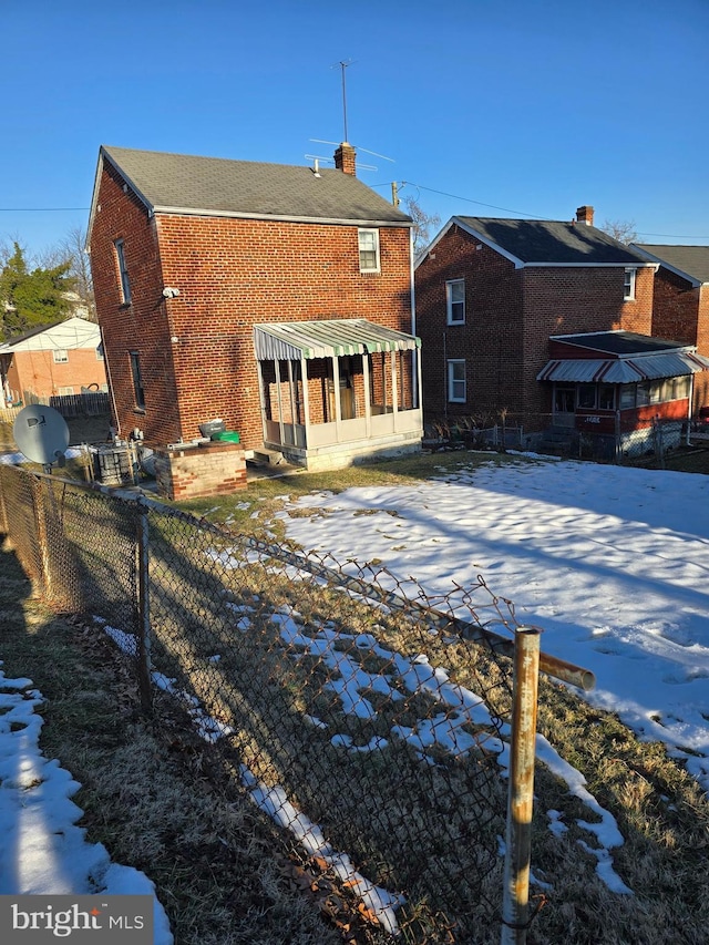 view of snow covered property