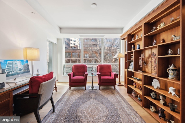 office area with light hardwood / wood-style flooring