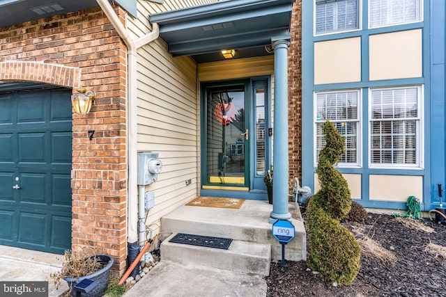 property entrance featuring a garage