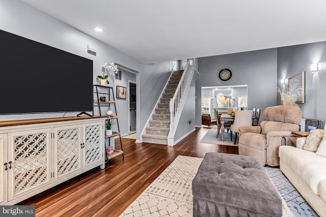 living room with dark wood-type flooring