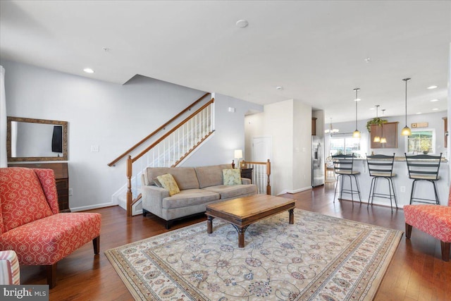 living room with dark wood-type flooring