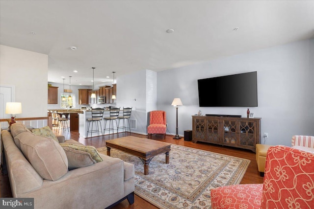 living room with hardwood / wood-style floors