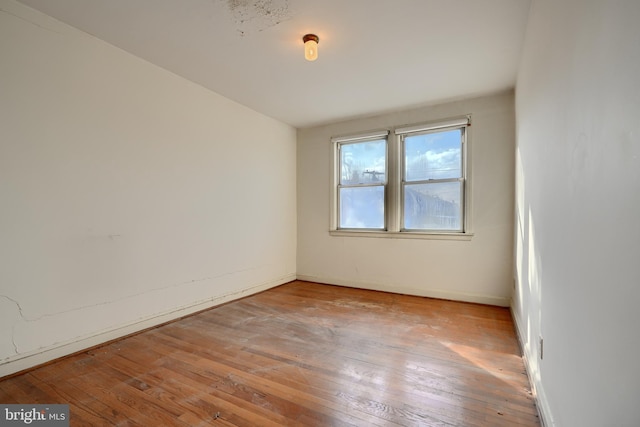 unfurnished room featuring light hardwood / wood-style flooring