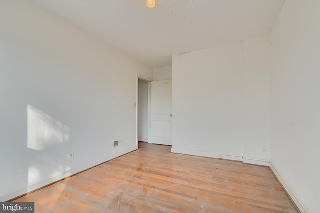 unfurnished room featuring light wood-type flooring