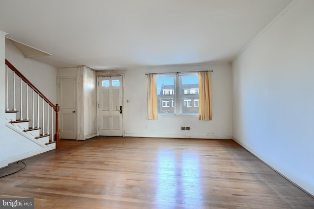 foyer entrance featuring light wood-type flooring