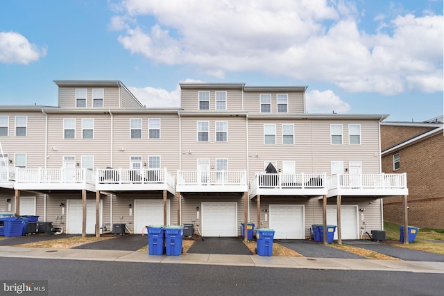 rear view of property with cooling unit