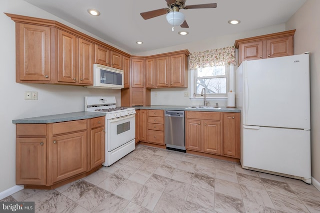 kitchen with ceiling fan, white appliances, and sink