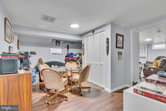 dining space featuring hardwood / wood-style floors