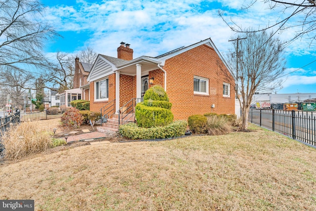 view of home's exterior featuring a yard