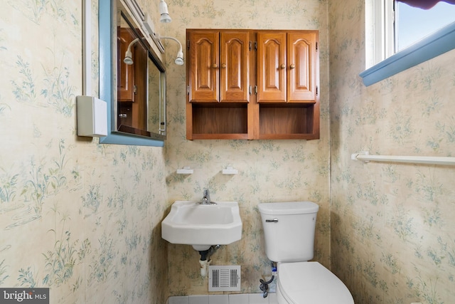 bathroom with sink and toilet