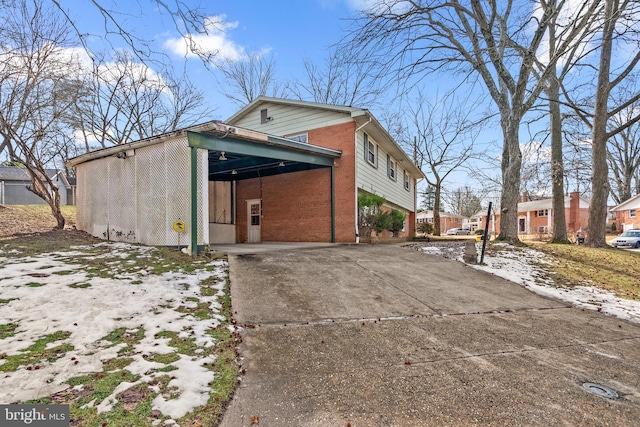 exterior space featuring a carport