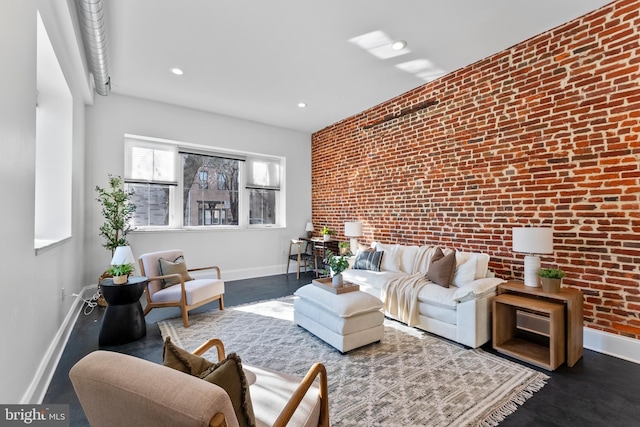 living room with brick wall