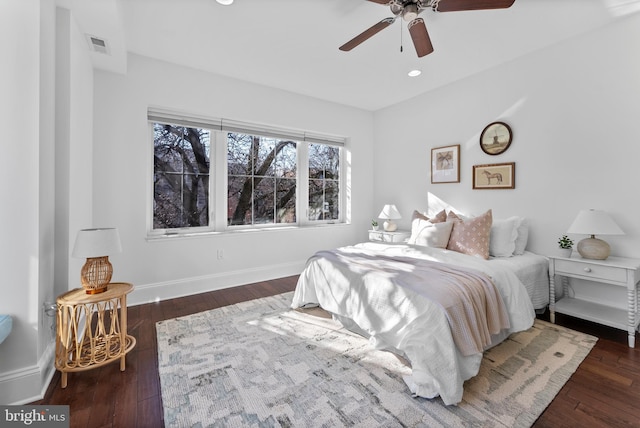 bedroom featuring dark wood-type flooring and ceiling fan