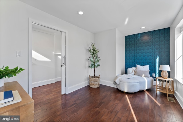 bedroom featuring dark hardwood / wood-style flooring