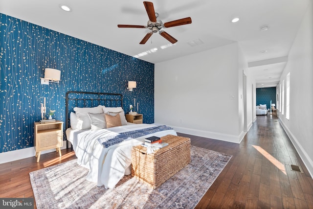 bedroom featuring dark wood-type flooring and ceiling fan