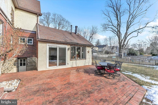 view of snow covered patio