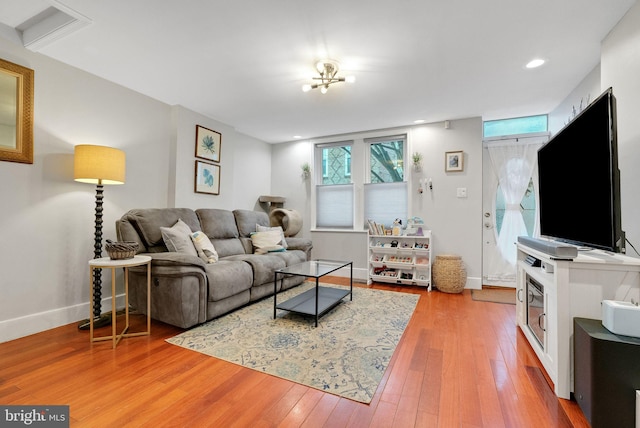 living room with wood-type flooring