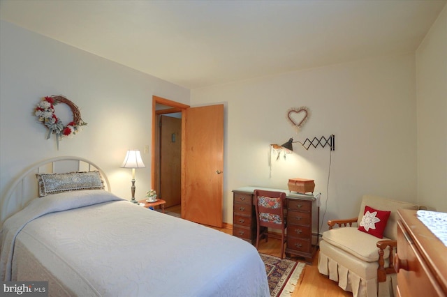 bedroom featuring hardwood / wood-style floors