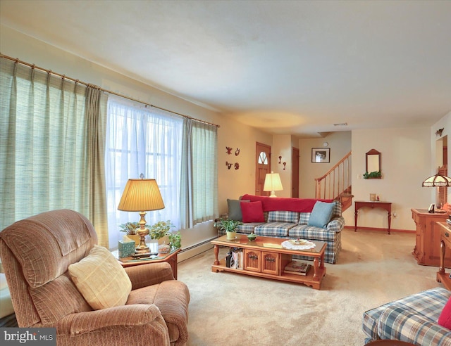 living room featuring a baseboard radiator and carpet floors