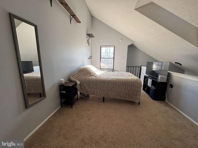 carpeted bedroom with lofted ceiling and a textured ceiling