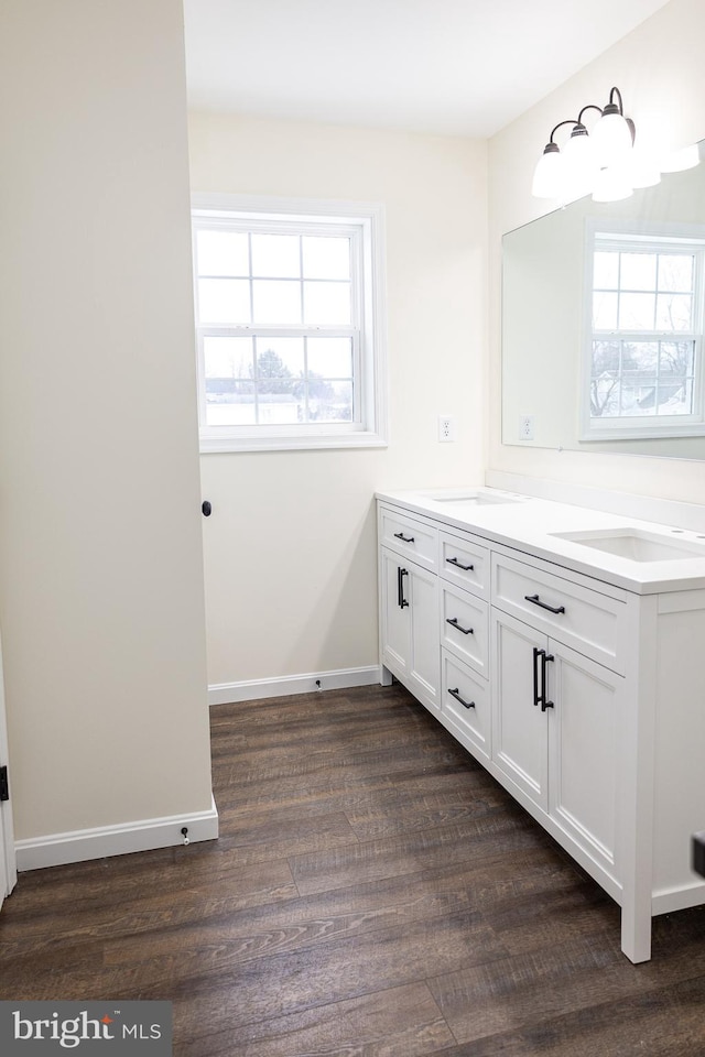 bathroom featuring vanity and hardwood / wood-style floors