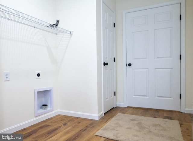 washroom with electric dryer hookup and hardwood / wood-style floors