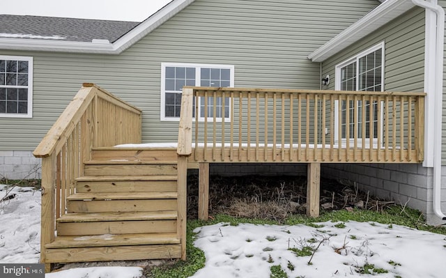 view of snow covered deck