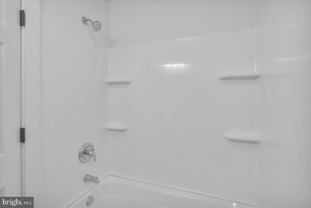 bathroom featuring shower / washtub combination