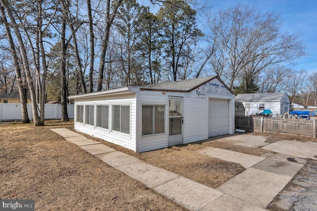 view of outbuilding featuring a garage