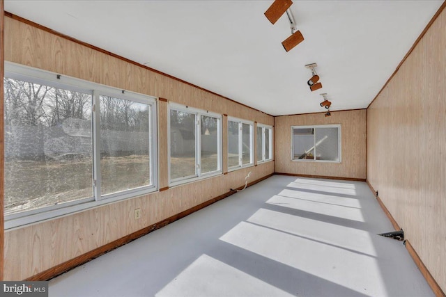 sunroom / solarium with rail lighting