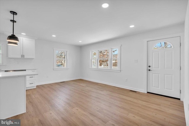 entryway with light wood-type flooring