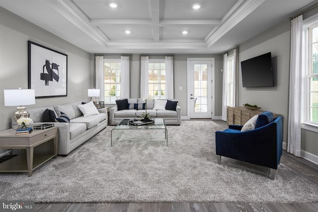 living room with hardwood / wood-style flooring, ornamental molding, coffered ceiling, and beam ceiling