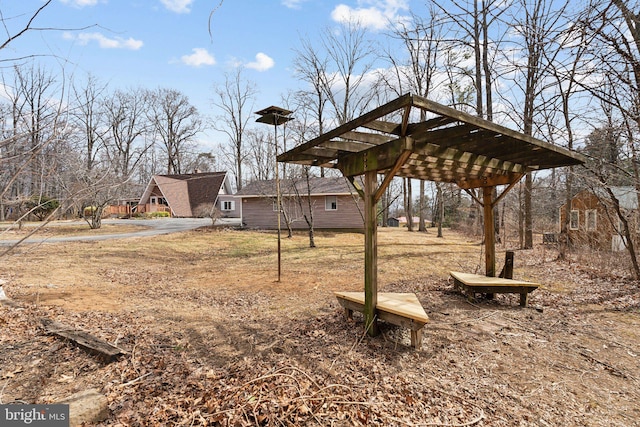 view of yard with a pergola