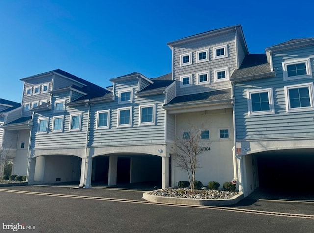 view of front of property featuring a garage