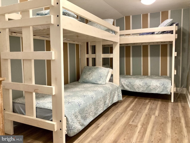 bedroom featuring wood-type flooring