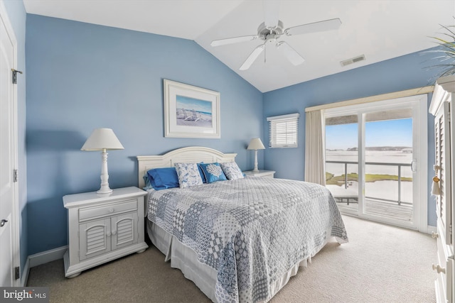 carpeted bedroom featuring lofted ceiling, access to outside, and ceiling fan