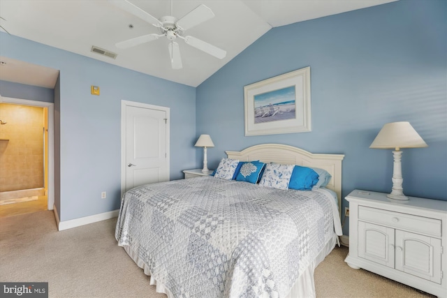 carpeted bedroom with vaulted ceiling and ceiling fan