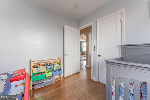 bedroom featuring hardwood / wood-style floors