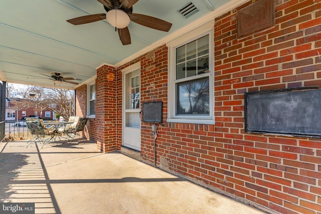 view of patio / terrace featuring ceiling fan