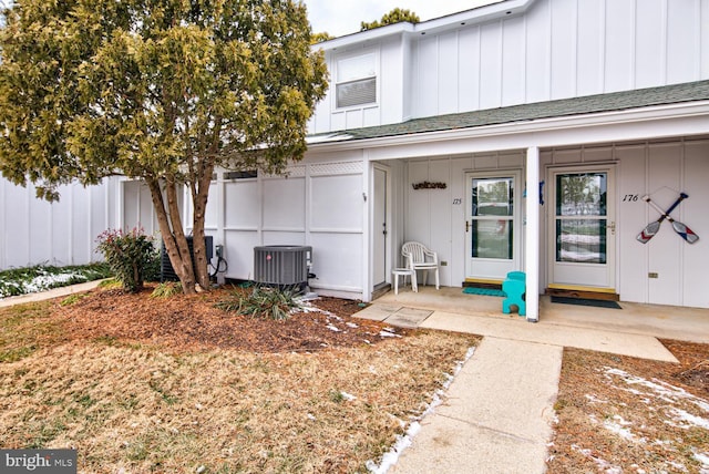 doorway to property with central air condition unit