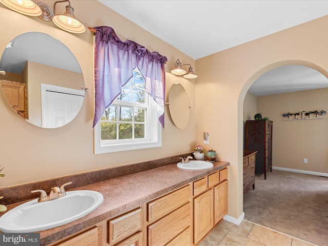 bathroom with vanity and tile patterned floors