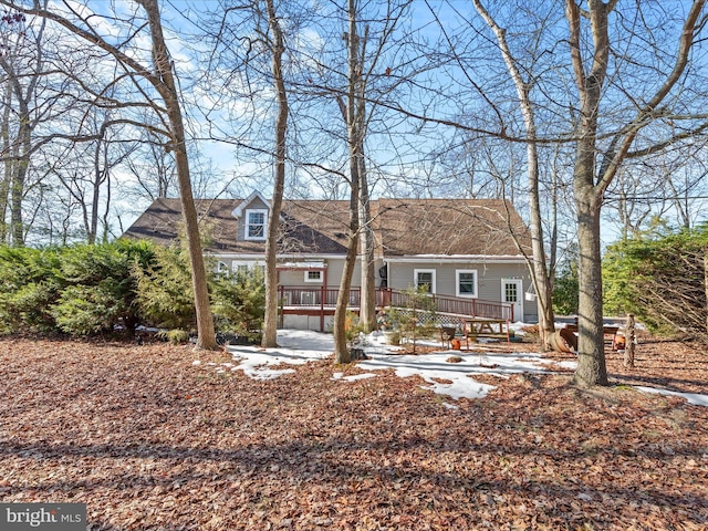 view of front of house with a deck