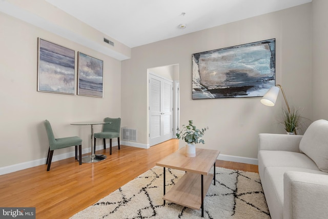 living room with hardwood / wood-style flooring