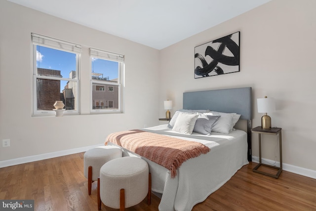 bedroom featuring hardwood / wood-style floors