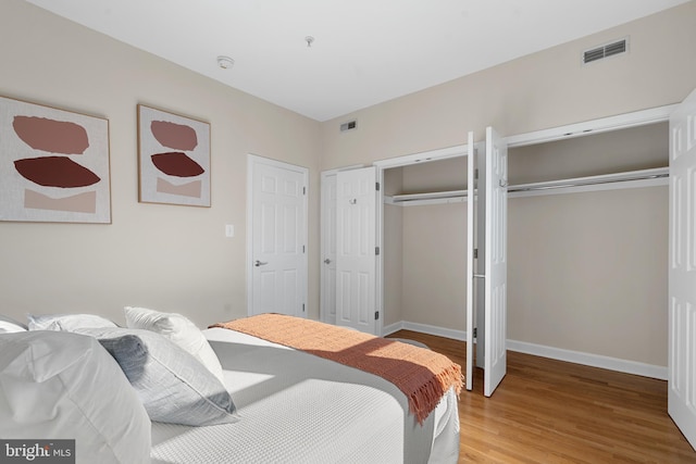 bedroom featuring hardwood / wood-style flooring