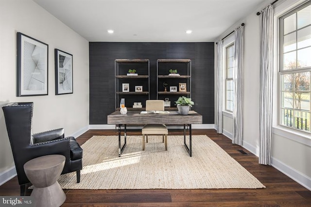 office space featuring dark hardwood / wood-style flooring