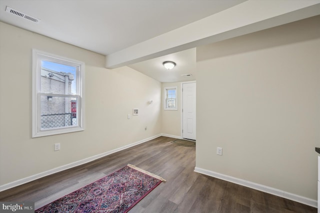 empty room featuring hardwood / wood-style floors