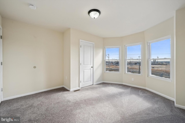 unfurnished bedroom with carpet floors