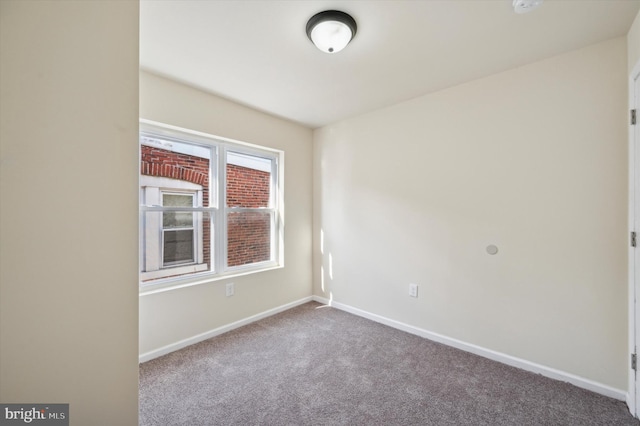 empty room featuring carpet floors