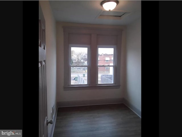 empty room featuring dark hardwood / wood-style floors